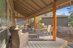 Expansive wrap around deck w seated dining, lounge chairs